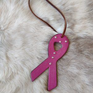Custom leather breast cancer emblem